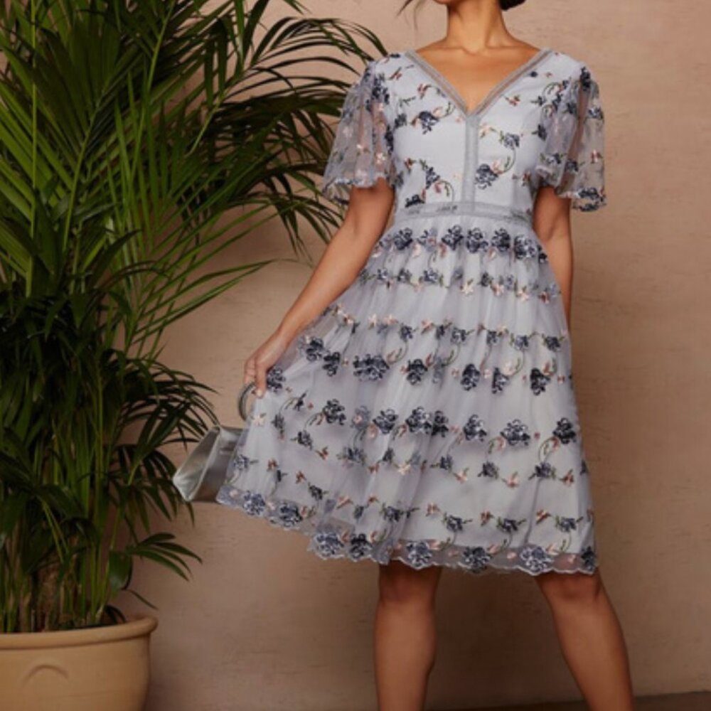 Chi Chi London Size 8 blue in color with floral print, wedding guest ready